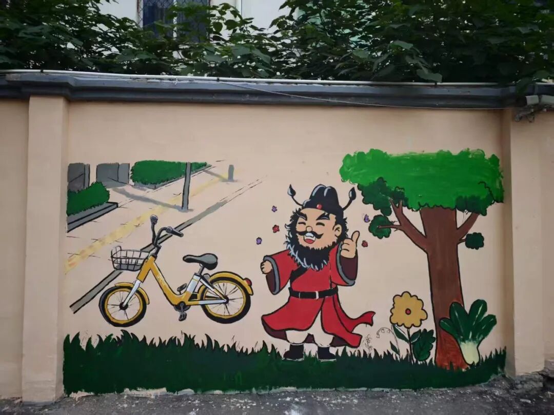 团灵璧县委组织大学生志愿者开展环保主题墙绘活动
